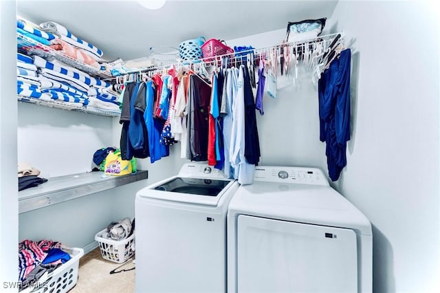 10329 Canal Brook Ln, Lehigh Acres, FL 33936 - laundry room with independent washer and dryer and tile patterned floors