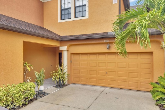 3781 Costa Maya Way Unit 101, Estero, FL 33928 - garage featuring driveway