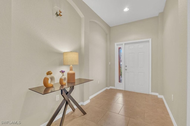 3781 Costa Maya Way Unit 101, Estero, FL 33928 - tiled foyer with baseboards and recessed lighting