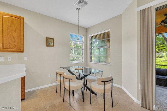 3781 Costa Maya Way Unit 101, Estero, FL 33928 - dining space featuring light tile patterned floors and baseboards