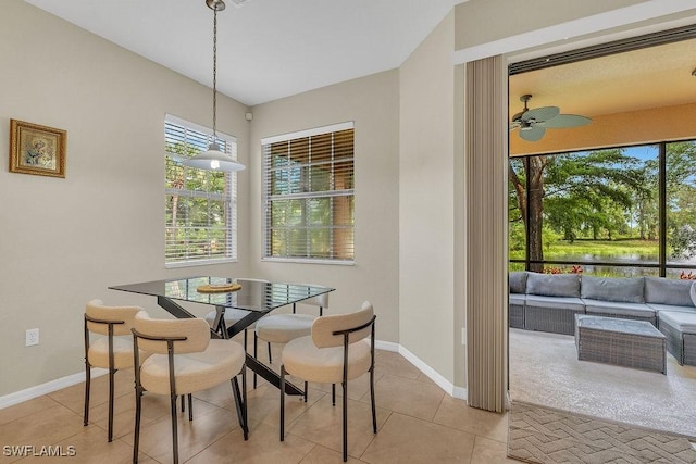 3781 Costa Maya Way Unit 101, Estero, FL 33928 - dining space featuring healthy amount of natural light, light tile patterned flooring, and a ceiling fan