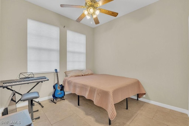 3781 Costa Maya Way Unit 101, Estero, FL 33928 - bedroom with light tile patterned floors and ceiling fan