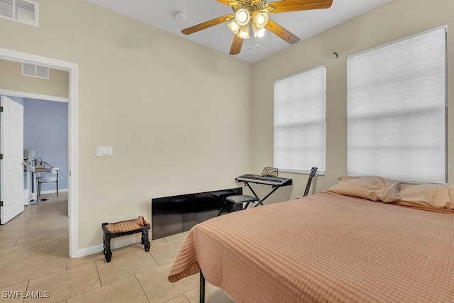 3781 Costa Maya Way Unit 101, Estero, FL 33928 - bedroom featuring light tile patterned floors and a ceiling fan