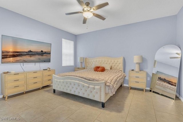 3781 Costa Maya Way Unit 101, Estero, FL 33928 - bedroom with light tile patterned flooring, a ceiling fan, and arched walkways