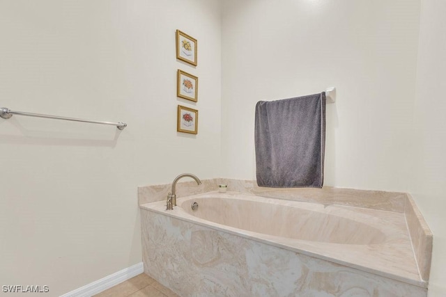 3781 Costa Maya Way Unit 101, Estero, FL 33928 - full bathroom featuring a bath and tile patterned flooring