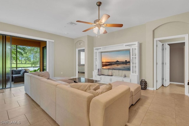 3781 Costa Maya Way Unit 101, Estero, FL 33928 - living area with light tile patterned floors and a ceiling fan