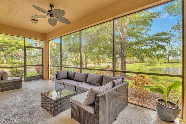 3781 Costa Maya Way Unit 101, Estero, FL 33928 - sunroom with ceiling fan, an outdoor hangout area, and a water view
