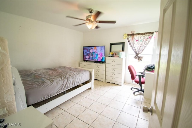4856/4858 24th St SW, Lehigh Acres, FL 33993 - bedroom with light tile patterned flooring, ceiling fan, and an office area