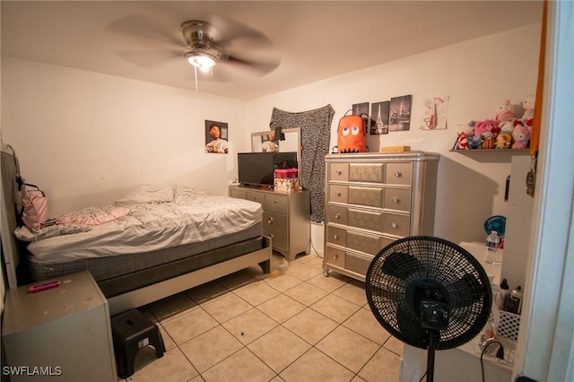 4856/4858 24th St SW, Lehigh Acres, FL 33993 - bedroom with light tile patterned floors and a ceiling fan