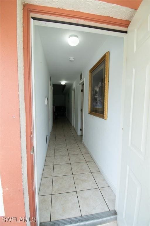 4856/4858 24th St SW, Lehigh Acres, FL 33993 - hall with light tile patterned floors