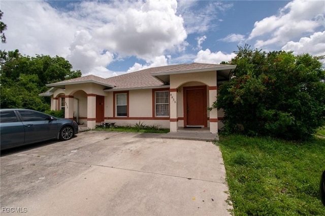 4856/4858 24th St SW, Lehigh Acres, FL 33993 - view of front of property featuring stucco siding