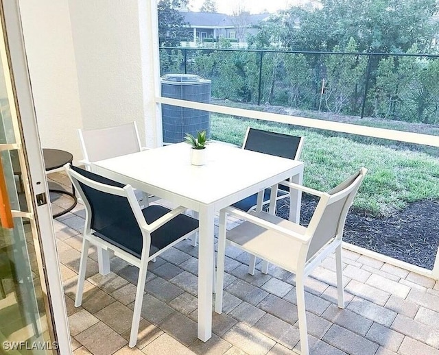 15141 Wildflower Cir, Naples, FL 34119 - balcony with outdoor dining space