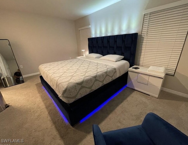 15141 Wildflower Cir, Naples, FL 34119 - bedroom with carpet floors and baseboards