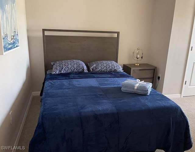 15141 Wildflower Cir, Naples, FL 34119 - bedroom with carpet and baseboards