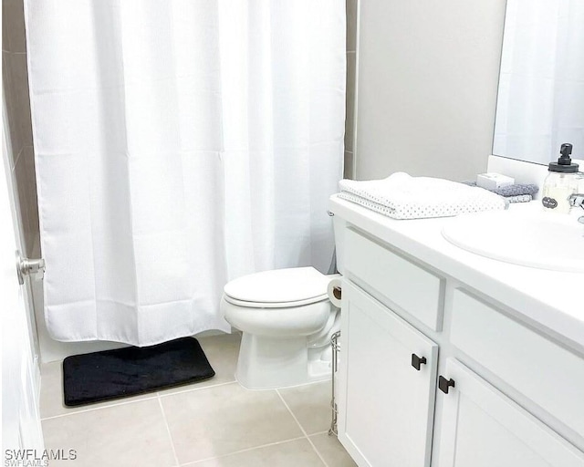 15141 Wildflower Cir, Naples, FL 34119 - full bathroom with vanity, tile patterned flooring, and a shower with curtain