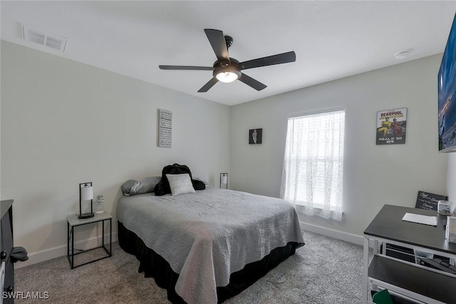 2922 20th St SW, Lehigh Acres, FL 34120 - carpeted bedroom with baseboards and ceiling fan
