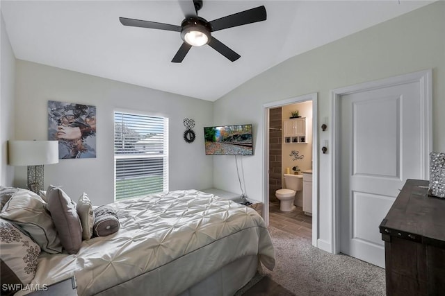 2922 20th St SW, Lehigh Acres, FL 34120 - carpeted bedroom with lofted ceiling, ensuite bath, and a ceiling fan