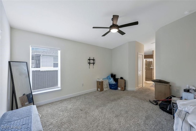 2922 20th St SW, Lehigh Acres, FL 34120 - unfurnished bedroom featuring carpet flooring, ceiling fan, and ensuite bath