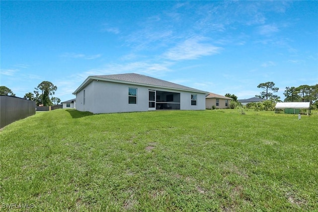 2922 20th St SW, Lehigh Acres, FL 34120 - back of house with stucco siding