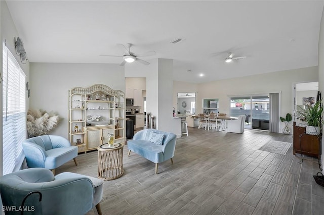 2922 20th St SW, Lehigh Acres, FL 34120 - living room featuring a ceiling fan and wood finished floors