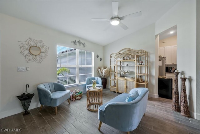 2922 20th St SW, Lehigh Acres, FL 34120 - living area featuring lofted ceiling, wood tiled floors, and a ceiling fan