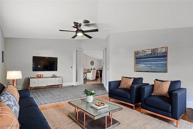 2922 20th St SW, Lehigh Acres, FL 34120 - living room with ceiling fan, vaulted ceiling, and wood finished floors