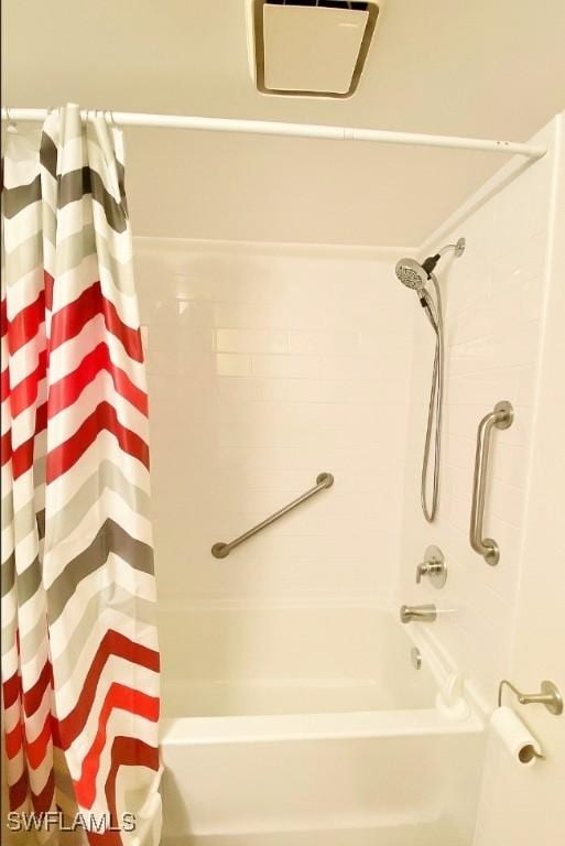 5735 Foxlake Dr Unit 1, North Fort Myers, FL 33917 - bathroom with shower / bathtub combination with curtain