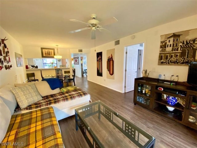 5735 Foxlake Dr Unit 1, North Fort Myers, FL 33917 - living area with wood finished floors and ceiling fan