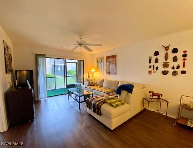 5735 Foxlake Dr Unit 1, North Fort Myers, FL 33917 - living area with dark wood-type flooring and ceiling fan