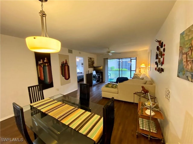 5735 Foxlake Dr Unit 1, North Fort Myers, FL 33917 - dining room featuring wood finished floors and ceiling fan