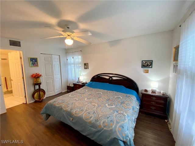 5735 Foxlake Dr Unit 1, North Fort Myers, FL 33917 - bedroom featuring wood finished floors, a closet, and a ceiling fan