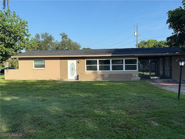 401 W Oregon Rd, Lehigh Acres, FL 33971 - single story home with a front lawn and brick siding