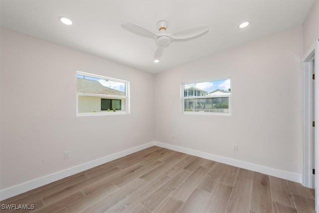 8336 Lagoon Rd, Fort Myers Beach, FL 33931 - unfurnished bedroom with light wood-type flooring, recessed lighting, and a ceiling fan