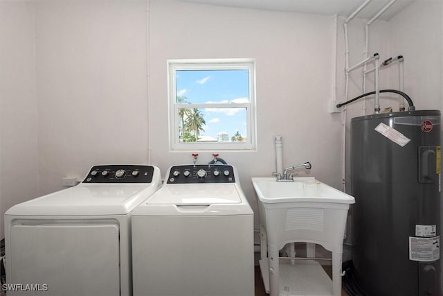8336 Lagoon Rd, Fort Myers Beach, FL 33931 - washroom featuring electric water heater and washing machine and dryer