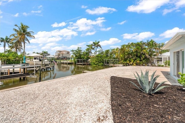 8336 Lagoon Rd, Fort Myers Beach, FL 33931 - dock area featuring a water view and boat lift