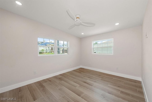 8336 Lagoon Rd, Fort Myers Beach, FL 33931 - empty room with light wood-style flooring, recessed lighting, and ceiling fan