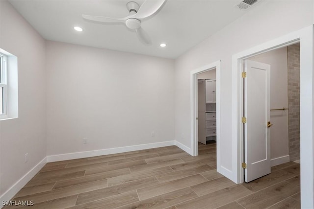 8336 Lagoon Rd, Fort Myers Beach, FL 33931 - spare room with light wood finished floors, a ceiling fan, and recessed lighting