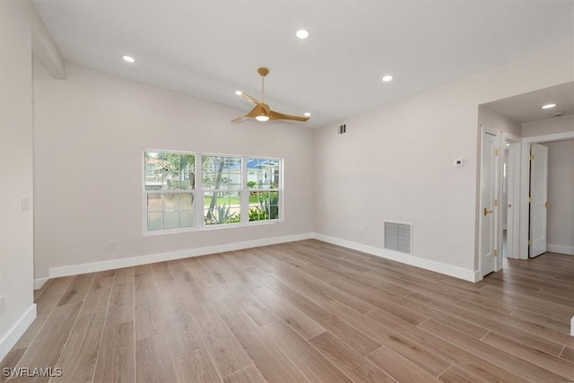 8336 Lagoon Rd, Fort Myers Beach, FL 33931 - empty room with light wood-type flooring and recessed lighting