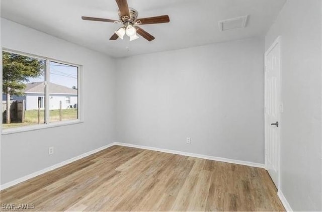 609 SW 22nd St, Cape Coral, FL 33991 - unfurnished room featuring wood finished floors, attic access, and ceiling fan