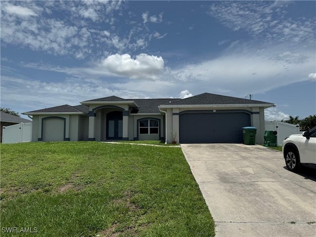 609 SW 22nd St, Cape Coral, FL 33991 - ranch-style home with an attached garage, concrete driveway, stucco siding, and a shingled roof