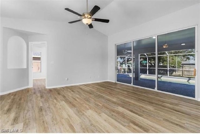 609 SW 22nd St, Cape Coral, FL 33991 - unfurnished room with lofted ceiling, ceiling fan, and wood finished floors
