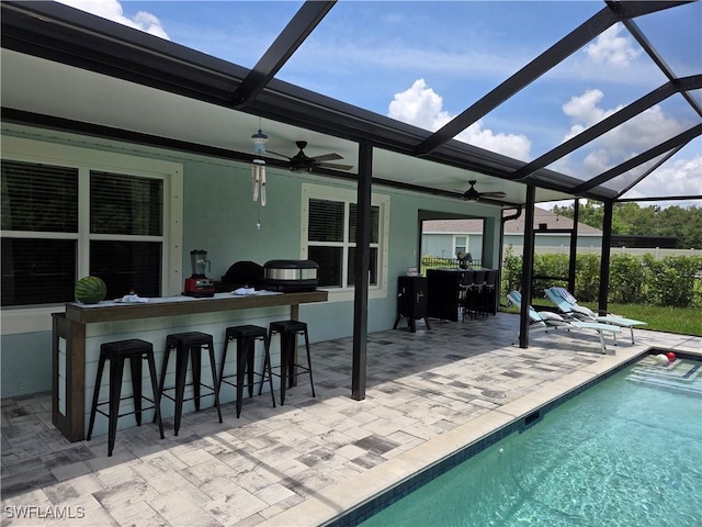 8868 E Cascade Price Cir, North Fort Myers, FL 33917 - outdoor pool with a lanai, a patio area, and ceiling fan