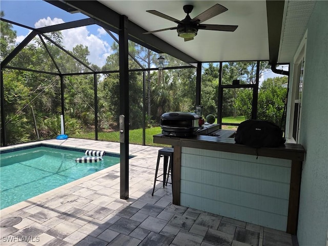 8868 E Cascade Price Cir, North Fort Myers, FL 33917 - swimming pool featuring a patio area, a grill, a lanai, and ceiling fan