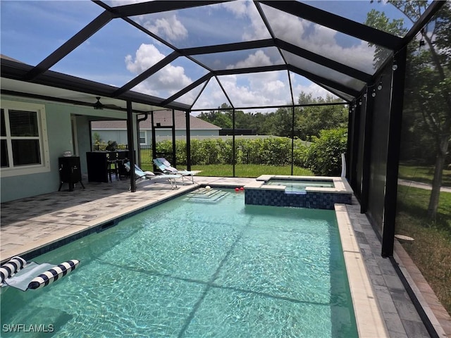 8868 E Cascade Price Cir, North Fort Myers, FL 33917 - view of pool featuring a patio, a pool with connected hot tub, a lanai, and ceiling fan