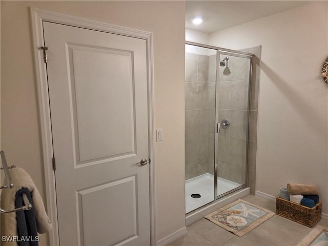 8868 E Cascade Price Cir, North Fort Myers, FL 33917 - bathroom featuring a shower stall and tile patterned flooring