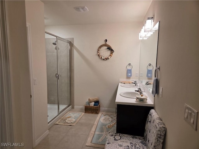 8868 E Cascade Price Cir, North Fort Myers, FL 33917 - bathroom featuring double vanity, a stall shower, and tile patterned flooring