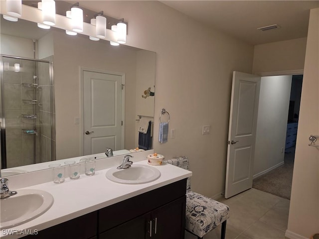 8868 E Cascade Price Cir, North Fort Myers, FL 33917 - full bath with double vanity, a stall shower, and tile patterned flooring