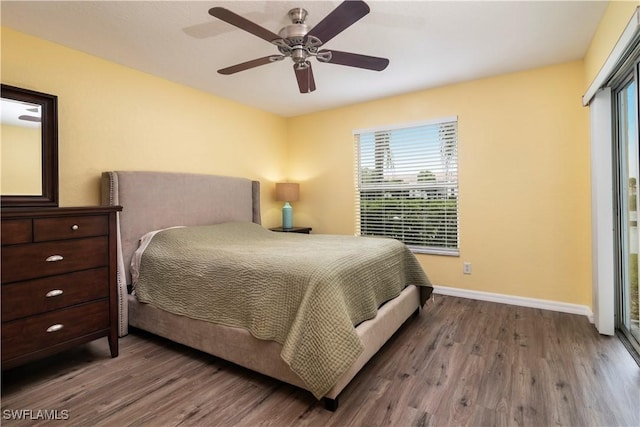 9580 Victoria Ln Unit A106, Naples, FL 34109 - bedroom featuring wood finished floors and ceiling fan