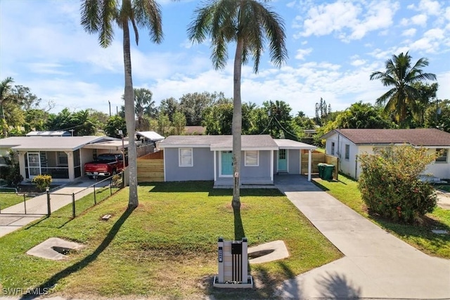 3064 Connecticut Ave, Naples, FL 34112 - view of front of house featuring an attached carport, concrete driveway, and stucco siding