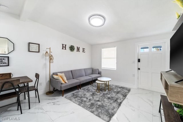 3064 Connecticut Ave, Naples, FL 34112 - living area featuring light marble finish flooring and beam ceiling